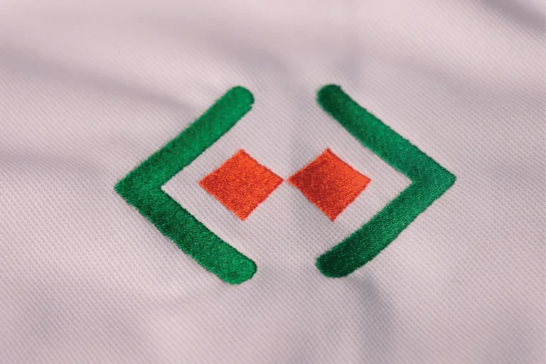 Embroidered golf shirt branding in Midrand — premium corporate logo stitching by Pixelsinframe