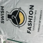 Custom vinyl printed t-shirt in Midrand — bold logo design on dark garment by Pixelsinframe