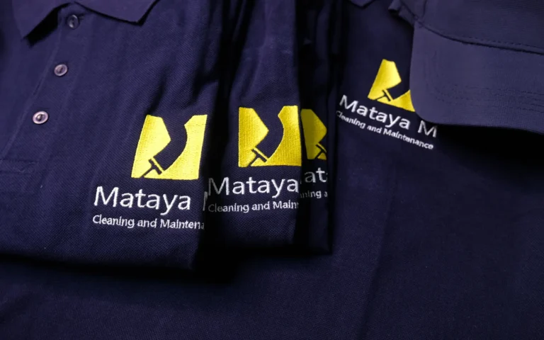 Embroidered Mataya M golf shirts and cap